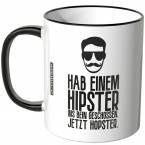 JUNIWORDS Tasse Hab einem Hipster ins Bein geschossen. Jetzt Hopster.